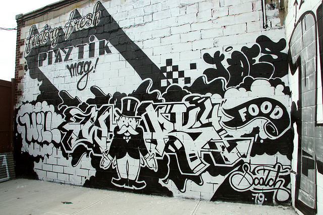A mural by street artist Scotch 79 reads "Will Work 4 Food." Photo credit: carnagenyc