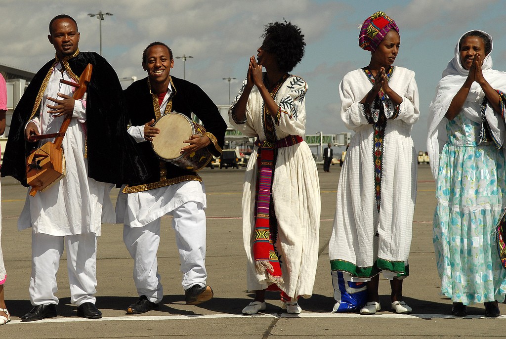 Members of Ethiopia's Ras Theatre group dance and play as they wait for Uganda's President Yoweri Museveni at Bole Airport, Addis Ababa - Photo by Flickr user, Andrew Heavens