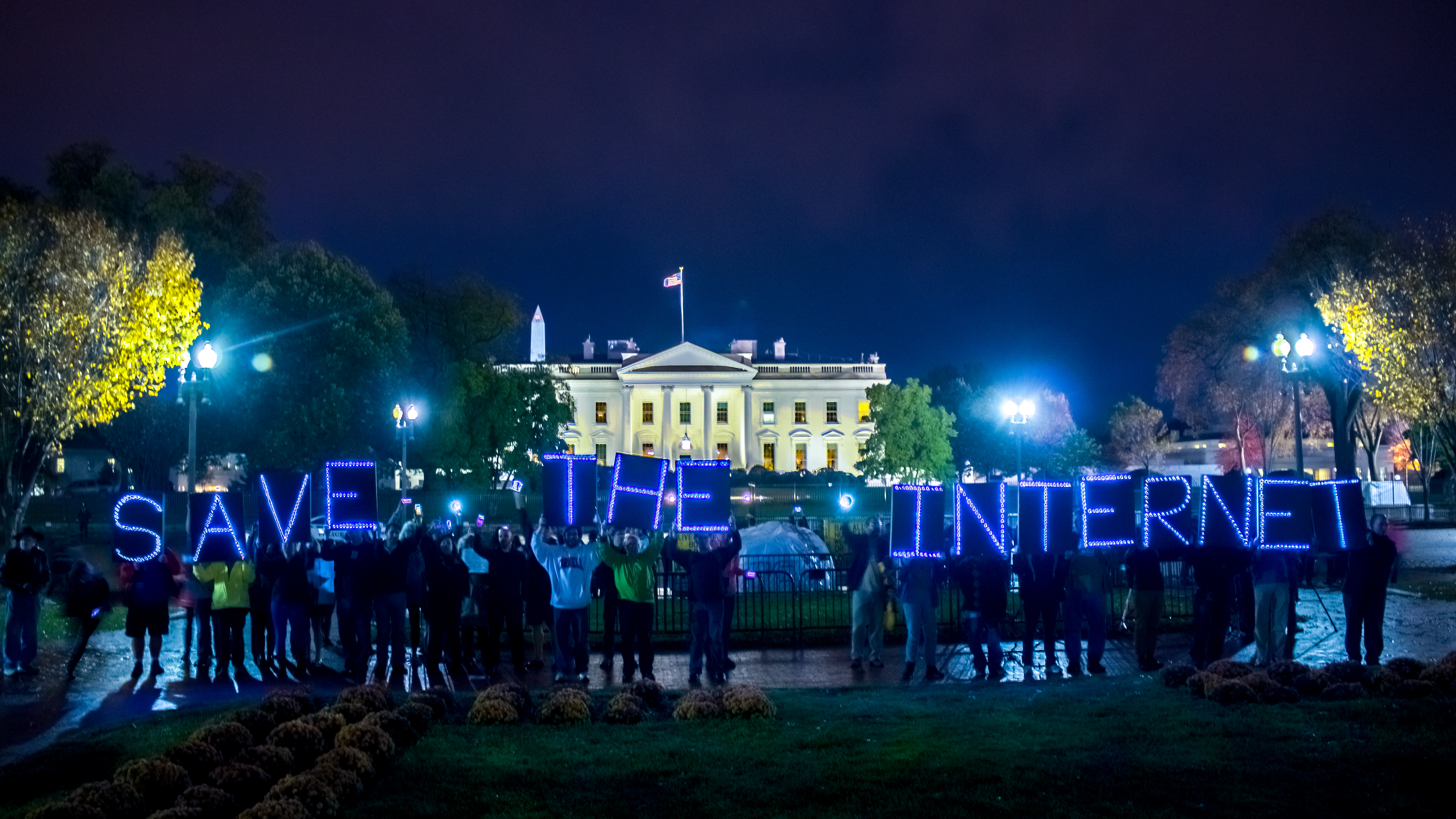 Demonstrators protest in front of the White House in support of Net Neutrality | Photo by Joseph Gruber via Creative Commons